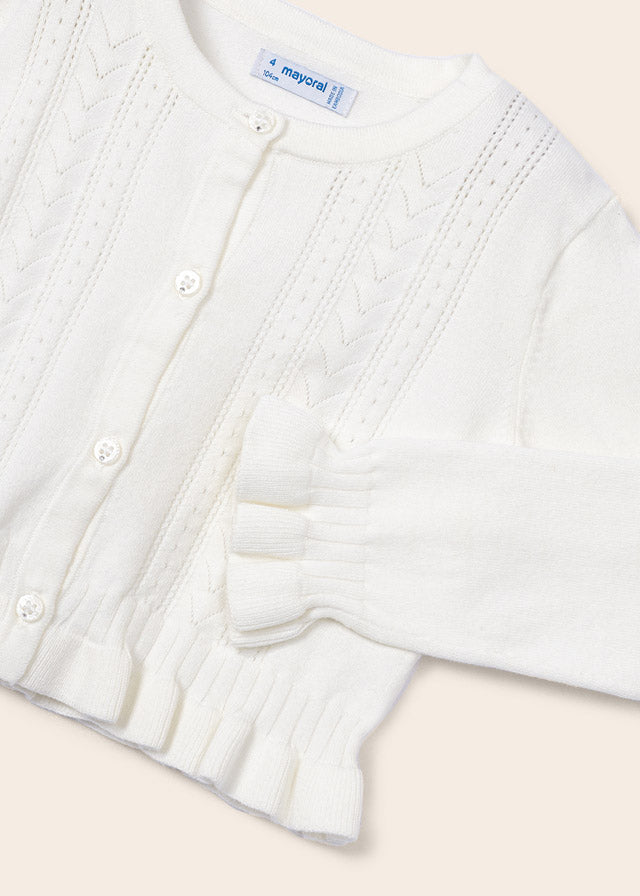 Torera de tricot con calados de algodón sostenible para niña