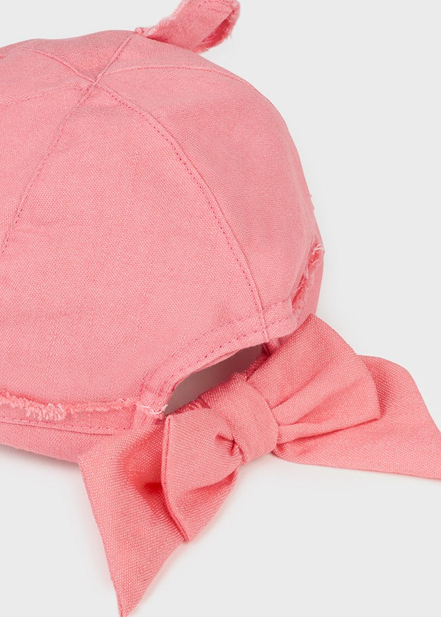 Gorra con adorno de orejas y moño de algodón sostenible para bebé