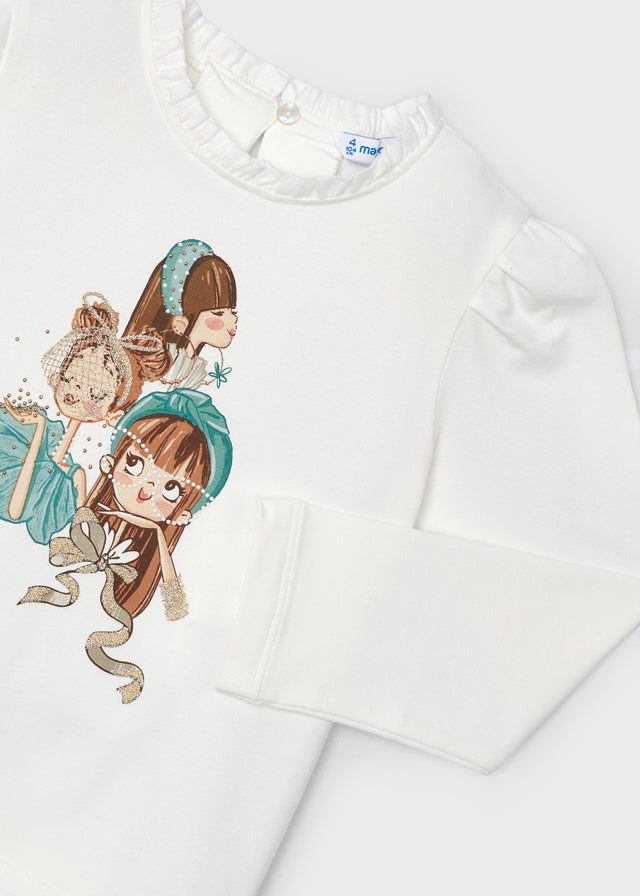 Playera dibujo holán cuello niña