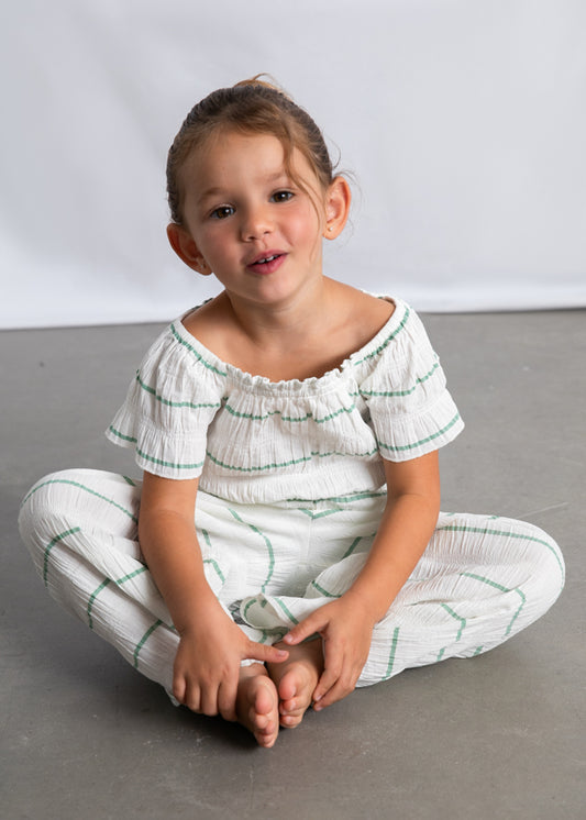Conjunto pantalón largo y top de rayas niña