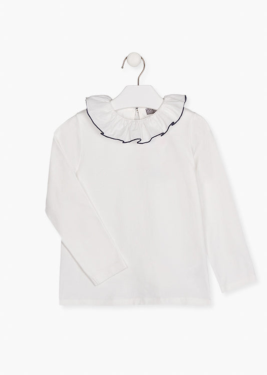 Blusa  con volante en cuello.