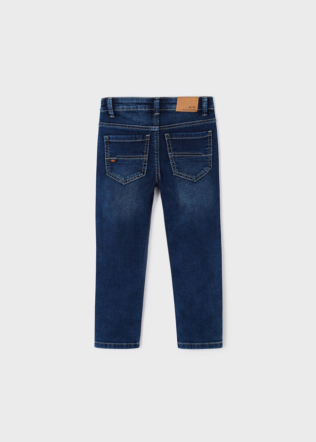 Pantalón largo mezclilla slim fit con algodón sostenible niño